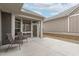 Beautiful outdoor patio features chairs, offering a relaxing space to enjoy the outdoors at 421 Raven Cliff St, Apex, NC 27523