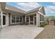 Large patio features ample seating and natural light perfect for entertaining guests at 421 Raven Cliff St, Apex, NC 27523