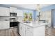Well-equipped kitchen with stainless steel appliances and a breakfast bar at 509 Rose Creek Ct, Zebulon, NC 27597