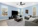 Comfortable living room with plush seating and natural light at 509 Rose Creek Ct, Zebulon, NC 27597