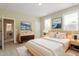 Bright bedroom with natural light, stylish décor, and a cozy atmosphere for comfortable living at 5417 Razan St, Raleigh, NC 27616