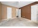Bedroom featuring a ceiling fan, closet and doorway for easy access, ready for design ideas at 545 Irvan St, Clayton, NC 27520