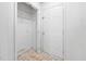 Bright hallway with a closet featuring plenty of storage next to an entry door at 545 Irvan St, Clayton, NC 27520