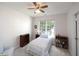 Cozy bedroom with a twin bed, side table, and natural light from a window at 5515 S Roxboro St # 16, Durham, NC 27713