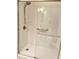 Walk-in shower with glass door, grab bars and shower seat at 5515 S Roxboro St # 16, Durham, NC 27713