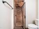 Tiled shower stall with glass door at 5816 Old Forge Cir, Raleigh, NC 27609