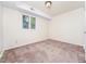 Spacious bedroom features a window for natural light and neutral carpeting throughout at 5816 Old Forge Cir, Raleigh, NC 27609