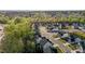 An aerial view of a quiet neighborhood surrounded by lush greenery at 604 Craftsman Ridge Trail, Knightdale, NC 27545