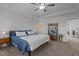 Bedroom with a ceiling fan, natural light, and a book shelf at 604 Craftsman Ridge Trail, Knightdale, NC 27545