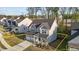 Stunning two-story home with a well-manicured lawn and a two-car garage at 604 Craftsman Ridge Trail, Knightdale, NC 27545