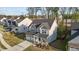 Stunning two-story home with a well-manicured lawn and a two-car garage at 604 Craftsman Ridge Trail, Knightdale, NC 27545