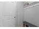 Functional mud room featuring a bench and hooks to organize coats and shoes near the entry door at 604 Craftsman Ridge Trail, Knightdale, NC 27545