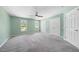 Spacious bedroom with a ceiling fan and big closets at 65 Forest Oaks Dr, Durham, NC 27705