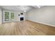 Bright living room with vaulted ceiling, fireplace, and access to the outdoor at 65 Forest Oaks Dr, Durham, NC 27705