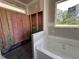 A bathroom showing the soaking tub and shower area ready for customization and finishing touches at 69 Tee Dr, Selma, NC 27576