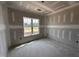 A bedroom showing a large window with a great view and plenty of natural light at 69 Tee Dr, Selma, NC 27576
