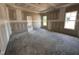 A Primary bedroom boasting trey ceilings and large windows that offer plenty of natural light at 69 Tee Dr, Selma, NC 27576