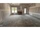 A sun-filled room featuring a large window providing bright, natural light and outdoor views at 69 Tee Dr, Selma, NC 27576