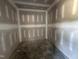 View of an empty room with freshly installed drywall ready for customization at 69 Tee Dr, Selma, NC 27576