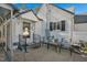 Quaint backyard area with metal table and chairs, perfect for relaxing at 708 W Pope St, Dunn, NC 28334