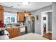 Practical kitchen featuring wood cabinets, stainless steel appliances, and a functional layout at 708 W Pope St, Dunn, NC 28334