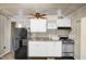 Kitchenette with stainless steel appliances and plenty of cabinet space at 708 W Pope St, Dunn, NC 28334