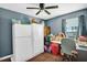Functional storage room with modern lighting, laminate flooring and a neutral color scheme at 708 W Pope St, Dunn, NC 28334