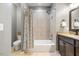 Bathroom showcasing a shower-tub combination, toilet, and vanity with a granite countertop at 725 Ancient Oaks Dr, Holly Springs, NC 27540