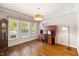 Spacious office with wood floors, natural light and built in desk at 725 Ancient Oaks Dr, Holly Springs, NC 27540