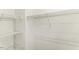 Spacious closet featuring multiple wire shelves for organized storage at 7528 Argent Valley Dr, Raleigh, NC 27616