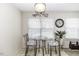 Bright breakfast nook with table and chairs, with view through window at 7528 Argent Valley Dr, Raleigh, NC 27616