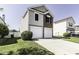 Charming two-story home with a two-car garage and well-kept lawn at 7528 Argent Valley Dr, Raleigh, NC 27616