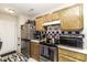 Well-equipped kitchen offers stainless steel appliances and abundant cabinet storage at 7528 Argent Valley Dr, Raleigh, NC 27616