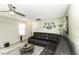 Comfortable living room features a stylish rug and a modern ceiling fan at 7528 Argent Valley Dr, Raleigh, NC 27616