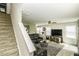 Inviting living room featuring plush seating, neutral tones, and a cozy rug at 7528 Argent Valley Dr, Raleigh, NC 27616