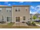 Backyard with patio, lawn, and siding featuring multiple windows and a glass sliding door at 8601 Red Canyon Way, Raleigh, NC 27616