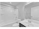 Bright bathroom featuring a bath tub, a single sink, and modern fixtures at 8601 Red Canyon Way, Raleigh, NC 27616
