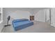 Spacious bedroom with gray walls, carpet, and a blue mattress on the floor at 8601 Red Canyon Way, Raleigh, NC 27616