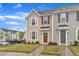 Beautiful two-story townhouse with a well-maintained front yard and inviting entrance at 8601 Red Canyon Way, Raleigh, NC 27616
