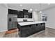 Contemporary kitchen with a center island, stainless steel appliances, and ample cabinet space at 8601 Red Canyon Way, Raleigh, NC 27616