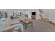 Open-concept living room with view of the kitchen and stairs at 8601 Red Canyon Way, Raleigh, NC 27616