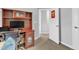 Office space with built-in desk and storage, and a view into another room at 8601 Red Canyon Way, Raleigh, NC 27616