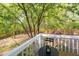 View of a lush backyard with mature trees, offering a serene and private outdoor space at 901 Clifford Dr, Durham, NC 27704