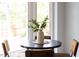 Close up on breakfast nook showing the design details including table, chairs, and centerpiece at 901 Clifford Dr, Durham, NC 27704