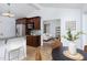 Open floor plan from eat-in kitchen to living room with stainless steel appliances at 901 Clifford Dr, Durham, NC 27704
