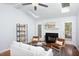 Cozy living room with fireplace, comfortable seating, and ample natural light at 901 Clifford Dr, Durham, NC 27704
