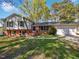 Charming brick home with two-car garage and a well-maintained front yard at 901 Forge Rd, Durham, NC 27713