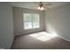 Bright bedroom with ample natural light and neutral carpeting at 910 Cedar Creek Dr, Wendell, NC 27591