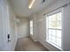 Walk-in closet featuring carpet and built-in shelving at 910 Cedar Creek Dr, Wendell, NC 27591