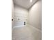 Light and bright laundry room is equipped with essential laundry hookups and offers plenty of space at 964 Double Helix Rd, Apex, NC 27523